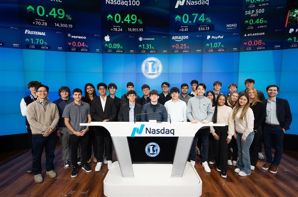students on nasdaq floor